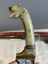 A collection of three daggers decorated with jade, silver and gold and an Indian mogul sword, India, 17/19th C.