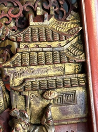 Two pairs of Chinese carved, lacquered and gilt-decorated wooden panels with figural design, 19th C.