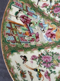 A large Chinese Canton famille rose dish and eight plates, 19th C.