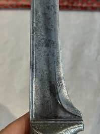 A collection of three daggers decorated with jade, silver and gold and an Indian mogul sword, India, 17/19th C.
