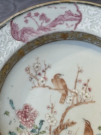 A pair of Chinese famille rose 'magpie and peony' plates with bianco-sopra-bianco rims, Yongzheng