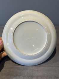 A large Chinese Canton famille rose dish and eight plates, 19th C.