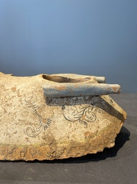 A pair of Chinese polychrome-painted terracotta camels with saddles, Tang