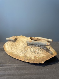 A pair of Chinese polychrome-painted terracotta camels with saddles, Tang