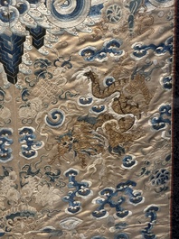 A large rectangular Chinese gold thread-embroidered silk panel decorated with four four-clawed dragons, Qing