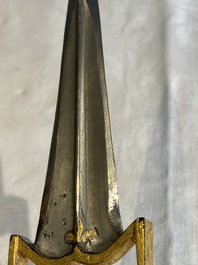 A collection of three daggers decorated with jade, silver and gold and an Indian mogul sword, India, 17/19th C.