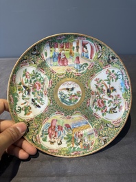 A large Chinese Canton famille rose dish and eight plates, 19th C.