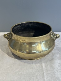 A Chinese bronze elephant-head-handled censer, Xuande mark, Kangxi/Qianlong