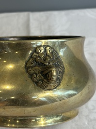 A Chinese bronze elephant-head-handled censer, Xuande mark, Kangxi/Qianlong