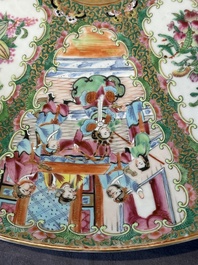 A large Chinese Canton famille rose dish and eight plates, 19th C.