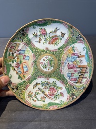 A large Chinese Canton famille rose dish and eight plates, 19th C.