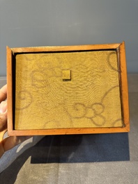 An oval Chinese imperial gold and silver filigree lidded 'dragon' box on reticulated stand and with presentation box, Qianlong mark and of the period