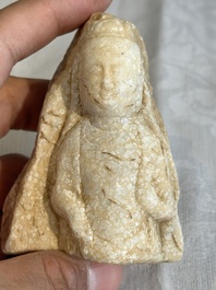 A Chinese marble bust of Buddha, Northern Qi