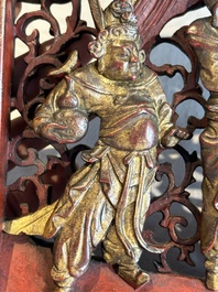 Two pairs of Chinese carved, lacquered and gilt-decorated wooden panels with figural design, 19th C.