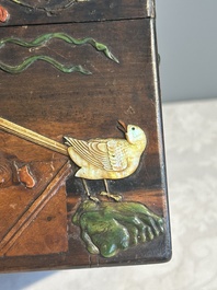 A square Chinese embellished and lacquered wooden box depicting a musician and two boys, Qing