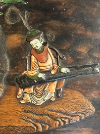 A square Chinese embellished and lacquered wooden box depicting a musician and two boys, Qing