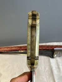 A collection of three daggers decorated with jade, silver and gold and an Indian mogul sword, India, 17/19th C.