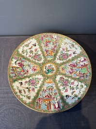 A large Chinese Canton famille rose dish and eight plates, 19th C.