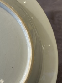A pair of Chinese famille rose 'magpie and peony' plates with bianco-sopra-bianco rims, Yongzheng