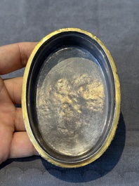 An oval Chinese imperial gold and silver filigree lidded 'dragon' box on reticulated stand and with presentation box, Qianlong mark and of the period