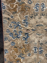 A large rectangular Chinese gold thread-embroidered silk panel decorated with four four-clawed dragons, Qing