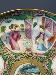 A large Chinese Canton famille rose dish and eight plates, 19th C.