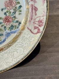 A pair of Chinese famille rose 'magpie and peony' plates with bianco-sopra-bianco rims, Yongzheng