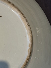 A large Chinese Canton famille rose dish and eight plates, 19th C.