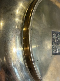 A Chinese bronze elephant-head-handled censer, Xuande mark, Kangxi/Qianlong