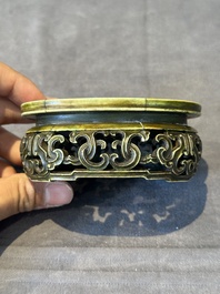 An oval Chinese imperial gold and silver filigree lidded 'dragon' box on reticulated stand and with presentation box, Qianlong mark and of the period