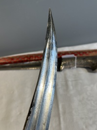 A collection of three daggers decorated with jade, silver and gold and an Indian mogul sword, India, 17/19th C.