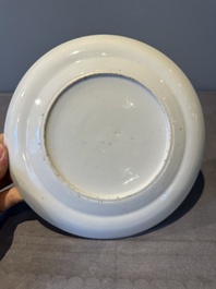 A large Chinese Canton famille rose dish and eight plates, 19th C.