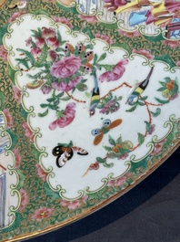 A large Chinese Canton famille rose dish and eight plates, 19th C.