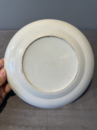 A large Chinese Canton famille rose dish and eight plates, 19th C.
