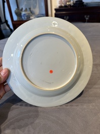 A pair of Chinese famille rose 'magpie and peony' plates with bianco-sopra-bianco rims, Yongzheng