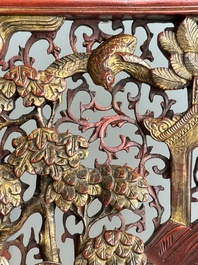 Two pairs of Chinese carved, lacquered and gilt-decorated wooden panels with figural design, 19th C.