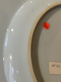 A pair of Chinese famille rose 'magpie and peony' plates with bianco-sopra-bianco rims, Yongzheng