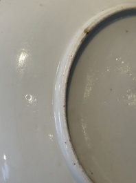 A large Chinese Canton famille rose dish and eight plates, 19th C.
