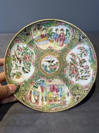 A large Chinese Canton famille rose dish and eight plates, 19th C.
