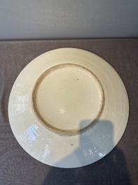 A large Chinese Canton famille rose dish and eight plates, 19th C.