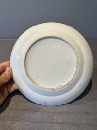 A large Chinese Canton famille rose dish and eight plates, 19th C.