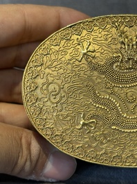 An oval Chinese imperial gold and silver filigree lidded 'dragon' box on reticulated stand and with presentation box, Qianlong mark and of the period