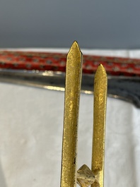 A collection of three daggers decorated with jade, silver and gold and an Indian mogul sword, India, 17/19th C.