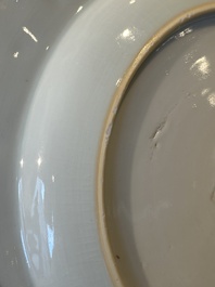 A pair of Chinese famille rose 'magpie and peony' plates with bianco-sopra-bianco rims, Yongzheng