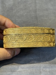 An oval Chinese imperial gold and silver filigree lidded 'dragon' box on reticulated stand and with presentation box, Qianlong mark and of the period