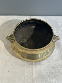 A Chinese bronze elephant-head-handled censer, Xuande mark, Kangxi/Qianlong