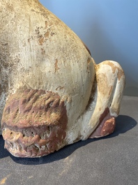 A pair of Chinese polychrome-painted terracotta camels with saddles, Tang