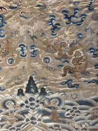 A large rectangular Chinese gold thread-embroidered silk panel decorated with four four-clawed dragons, Qing