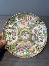 A large Chinese Canton famille rose dish and eight plates, 19th C.