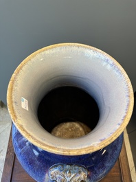 A large Chinese flamb&eacute; glaze 'hu' vase with Taotie handles, Qing